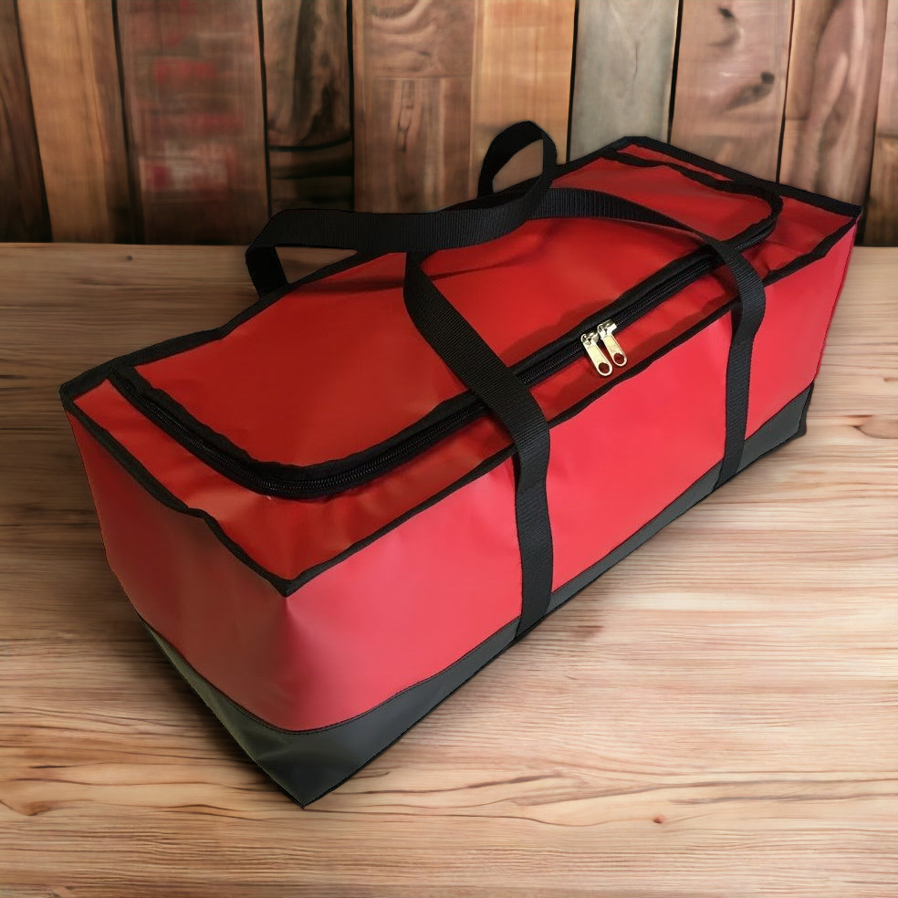 Red PVC gear bag in stables