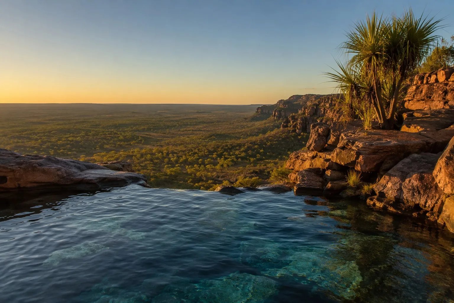 View from the top of Gunlom Falls in Kakadu National Park at golden hour