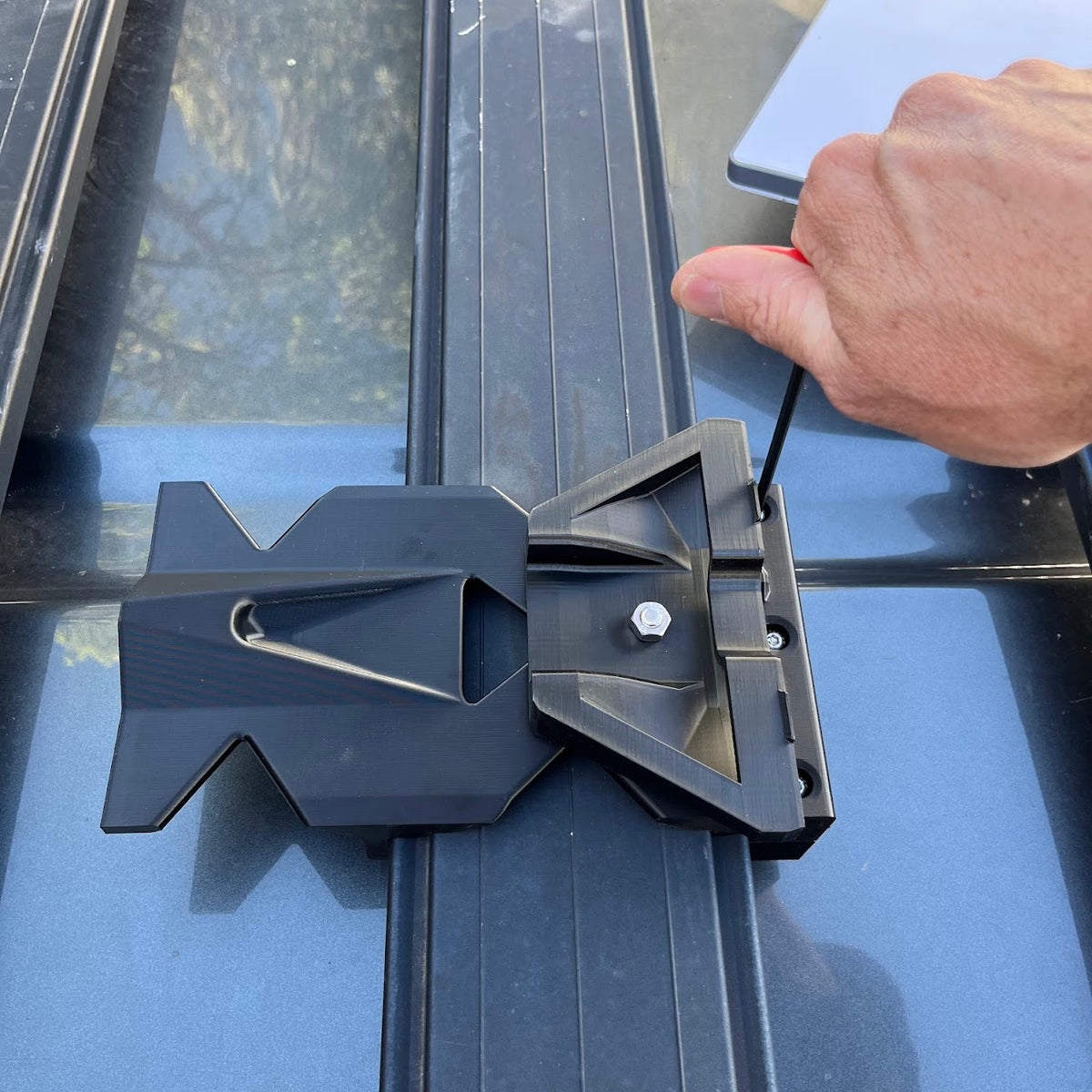 Three-bolt clamp system on the ARB Base Rack mount for enhanced stability