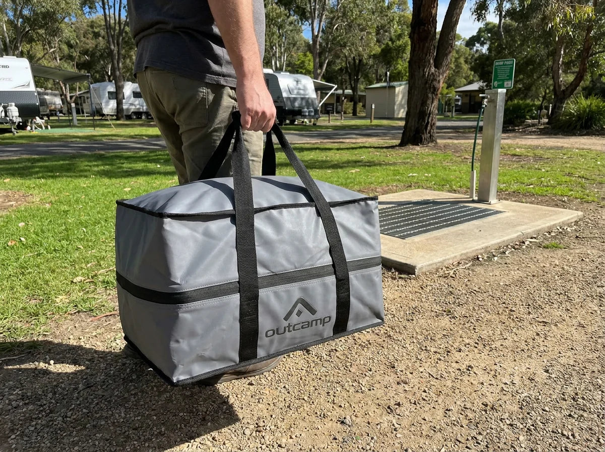 Outcamp Thetford SC250 carry bag being carried to dump point at Australian caravan park