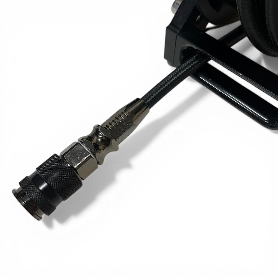 Auto-retract air hose reel 7m showing hose deployment and aluminium body