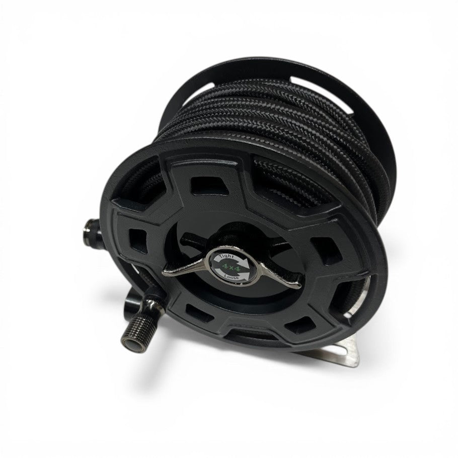 Compact auto-retract air hose reel showing quick-connect coupling and nozzle