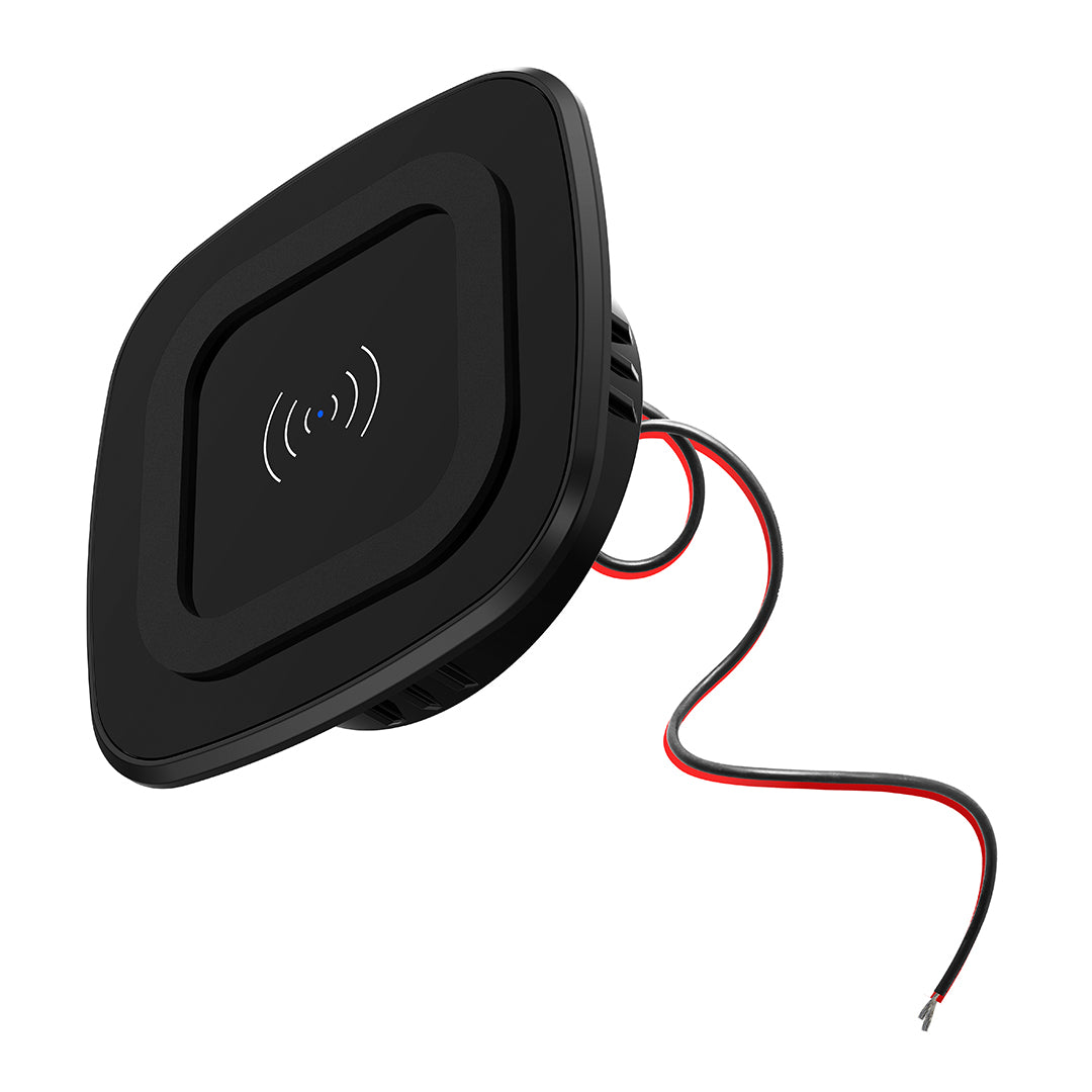 Square wireless charging pad installed flush in caravan benchtop with phone wirelessly charging