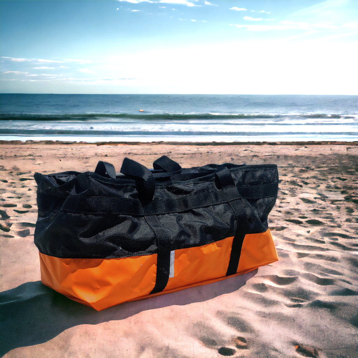 Watersports gear bag with beach equipment inside