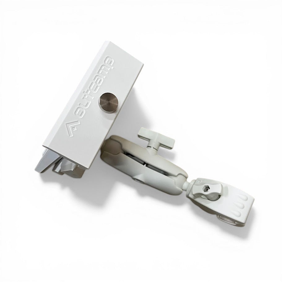 White Outcamp V2 rail mount clamp mechanism close-up showing rail grip design