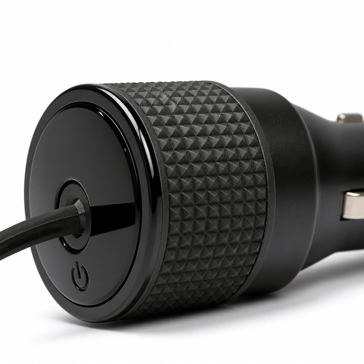 Close-up of the diamond knurled collar on the Starlink Mini 12V car adapter with the DC cable plugged into the front socket