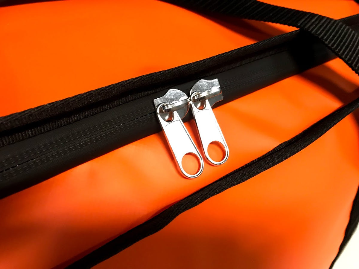 Waterproof zipper on camping clothes bag
